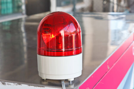 Red siren/light in factory.の写真素材