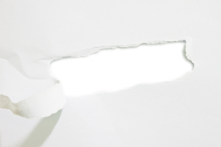 Torn paper, isolated on white background.の写真素材