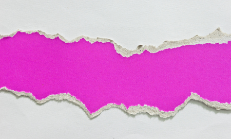 Torn pink paper with space for copy.の写真素材