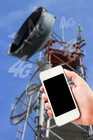 Hand holding smart phone with blank screenの写真素材