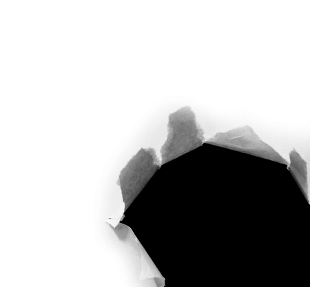 Hole ripped in paper. Copy spaceの写真素材