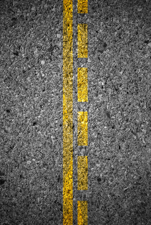 Lines and lane markings on the on asphalt road surface textureの写真素材