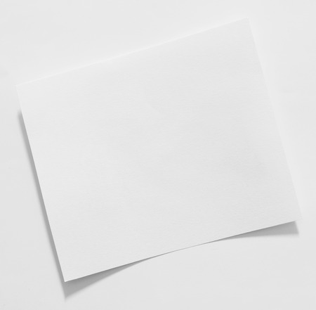 Old vintage torn creased paper isolated on white.の写真素材