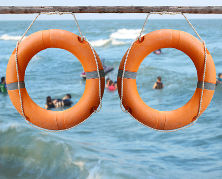 Orange lifebuoy, the rescuer on the river.の写真素材
