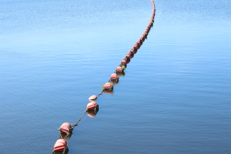 Red buoys in the seaの写真素材