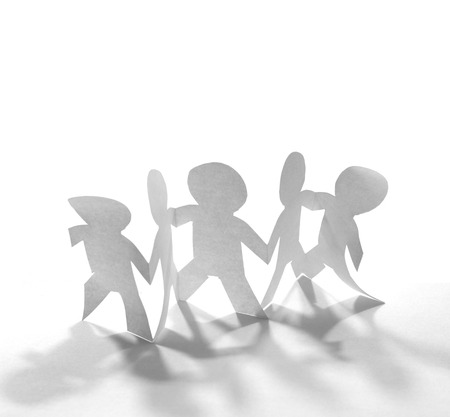 Team of paper doll peopleの写真素材