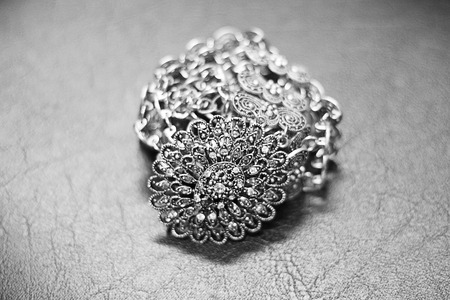 Thai style belt On Black leather Backgroundの写真素材