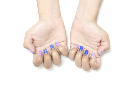 Women hands with nail manicure on white backgroundの写真素材