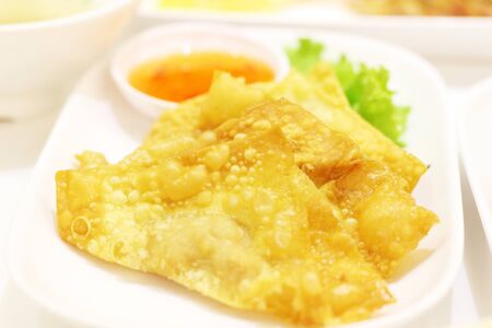 Fried dumplings on white plateの写真素材