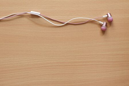 Headphones put on woodの写真素材