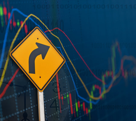 Traffic sign on the background of the financial chart. The concept of trading.の写真素材