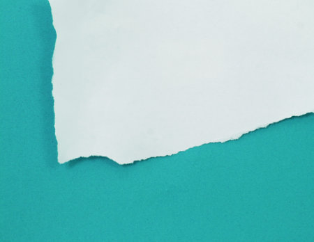 Torn paper with space for your message on blue background, flat layの写真素材