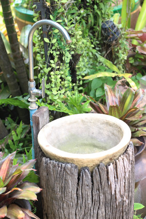 Bathroom faucet in the garden, vintage style.の写真素材