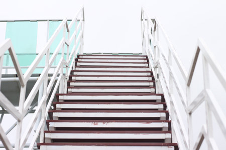 Staircase on the white wall in the modern building, stock photo