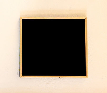 Blank blackboard on the wall in the old house, Thailand.