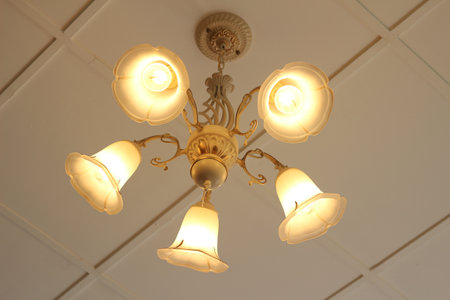 Vintage chandelier in a room, closeup of photo