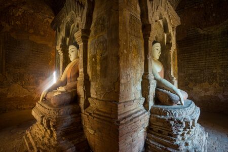 Old Buddha's statue in a Bagan pagoda, Mayanmarのeditorial素材
