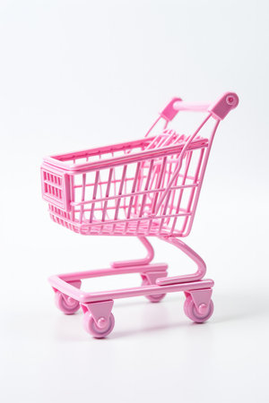 Pink Toy Toy Shopping Cart White Background. Shopping For Toys, Pink Toy Carts, Toy Storage, Shopping Cart Themes, White Background Photography, Styling A Shopping Cart, Shopping Accessories.の素材
