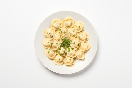 Top View Tortellini On Round Plate On Wihte Backgound.の素材