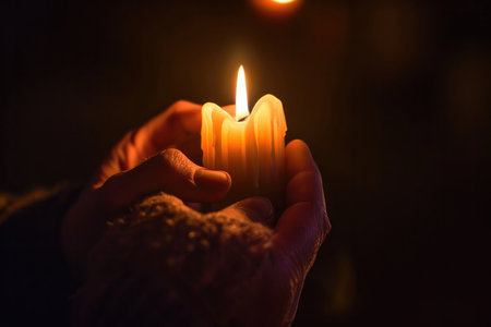 Embracing The Symbolic Power And Resilience Of A Flickering Candle. Concept Mystical Candlelight, Symbolic Strength, Resilience In Flames, Flickering Hope, Illuminating Ambiance.の素材