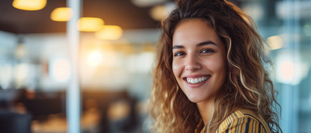 Young Woman Embraces Modern Technology With Joyful Work Ethic In Office. Concept Office Technology, Work Ethic, Young Professional, Embracing Technology.の素材