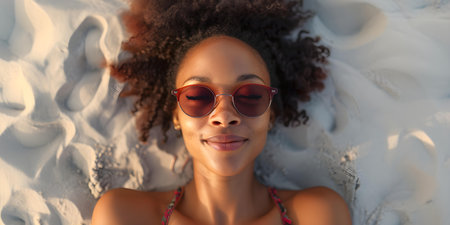 Joyful woman with trendy hairstyle and shades savoring a sandy beach. Concept Beach Babe, Trendy Hairstyle, Sunglasses Styling, Sandy Paradise, Joyful Momentsの素材