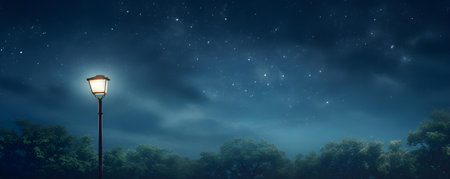 An ecofriendly streetlight glowing under starlight symbolizing sustainable urban development at night. Concept Ecofriendly Lighting, Sustainable Urban Development, Night Photographyの素材