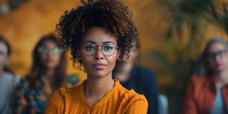 Speaker presenting at business seminar with diverse audience in conference hall. Concept Business Seminar, Speaker Presentation, Diverse Audience, Conference Hallの素材