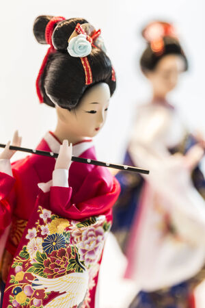 Japanese doll dressed up by kimono.の写真素材