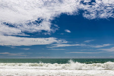 White cloud and blue sky at beautiful Maikao Beach, Phuket Thailandの写真素材