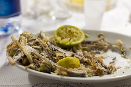 fishbones with squeezed lemonの写真素材