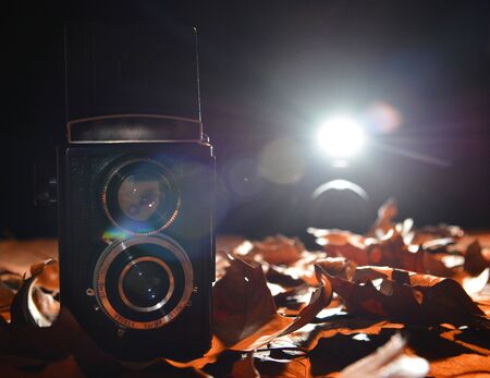 Retro design photo camera, still life photo