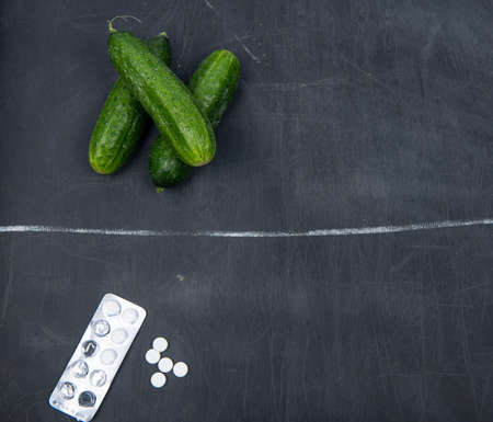 Healthy food vs pills with top view. Healthy food and medicine concept.の写真素材