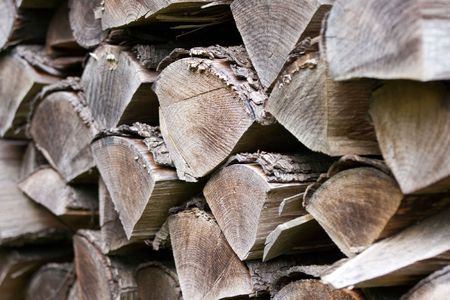 Stack of dry, old and bleached Firewood