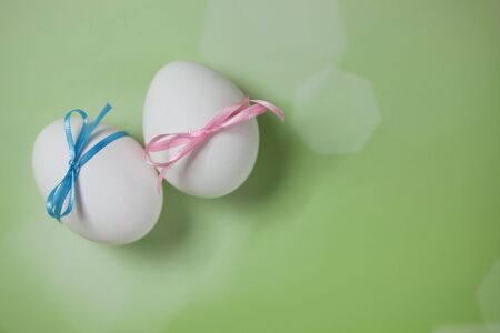 Easter Eggs with blue and pink ribbons