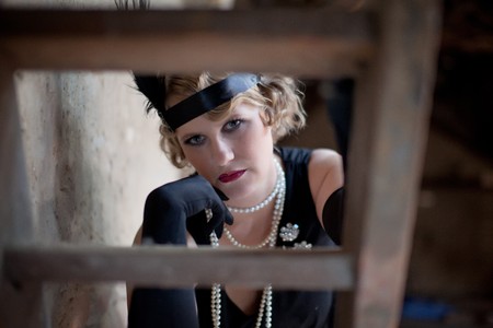 Vintage retro portrait of a woman costumed in 1920s styleの写真素材