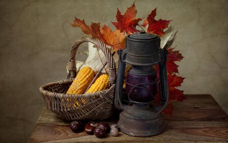 Still Life Autumn concept image with vegetables and wicker basketの写真素材