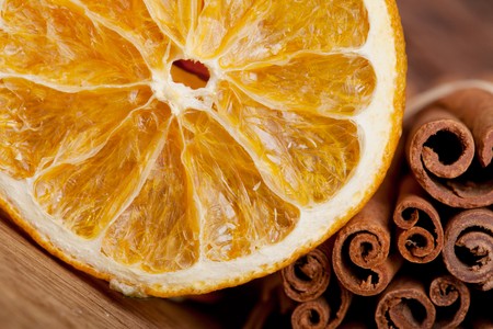 Slices of dried Orange with cinnamon sticksの写真素材