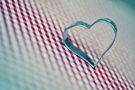 Cookie Cutters for christmas bakery on chequered clothの写真素材