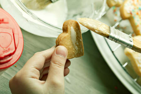 Making homemade christmas cookies in various shapesの写真素材