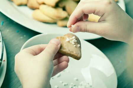 Making homemade christmas cookies in various shapesの写真素材