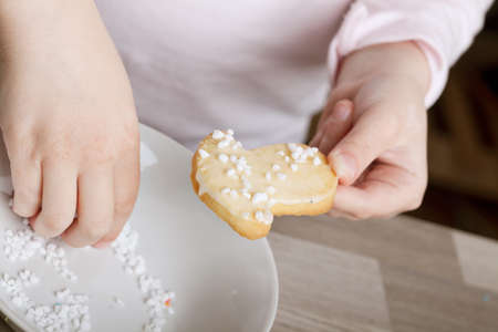 Making homemade christmas cookies in various shapesの写真素材