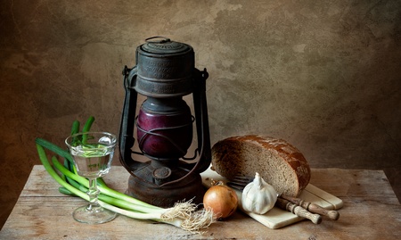 Still life with lamp and various organic vegetables with breadの写真素材