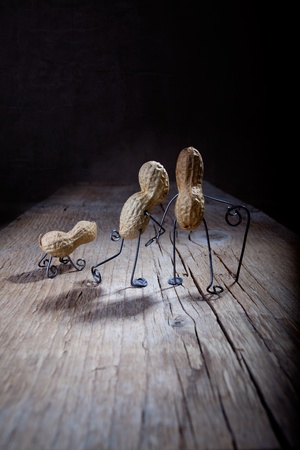 Miniature with old couple walking together