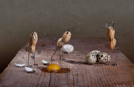 Peanut Easter Bunnies preparing eggs with some small mishaps
