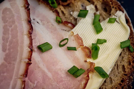 Slices of Bread with Ham, Butter and Chivesの写真素材