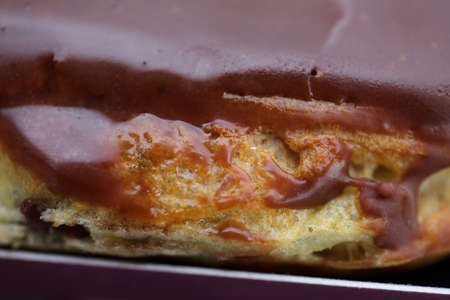 Delicious french pastry chocolate Eclair close up