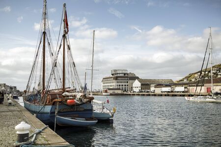 FECAMP, FRANCE - APRIL 8, 2015: Town and Ships in Port at Fecamp Normandy France on September 30...