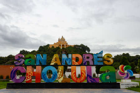 Lady of Remedies on a hill in the background in Cholula, Mexicoのeditorial素材