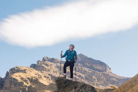 Woman Hiker On The Top Of The Mountainsの写真素材